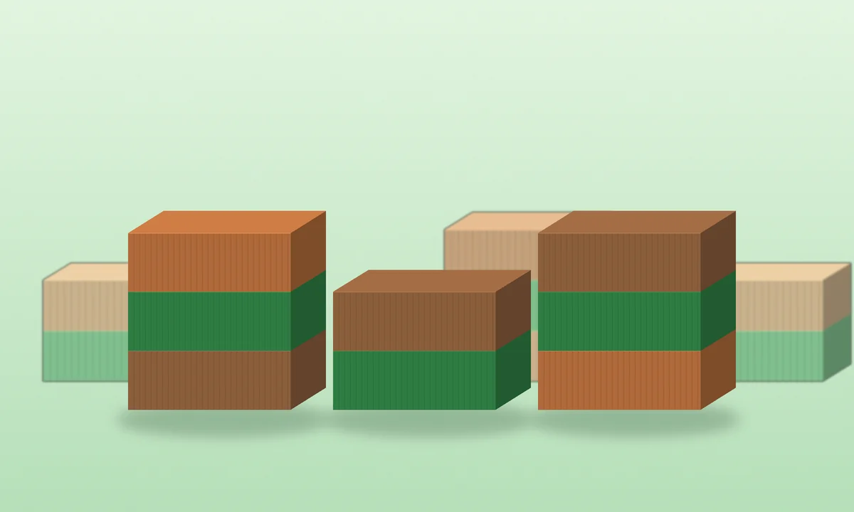 Stacked shipping containers in a freight yard